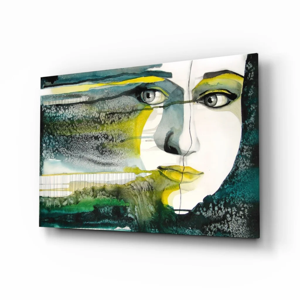 Bold abstract face wall art with vibrant yellow eyes and teal tones