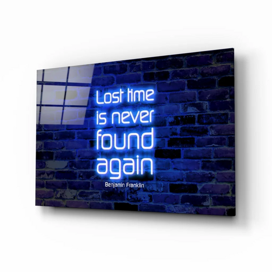 Blue neon Benjamin Franklin quote on glass wall art with brick design