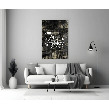Black and white wall art canvas print with April showers bring May flowers quote and butterflies above sofa