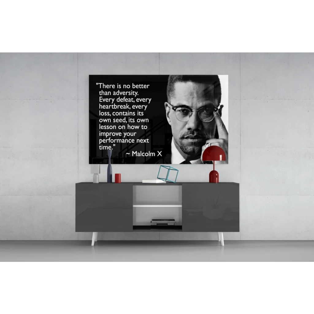 Malcolm X black-and-white portrait wall art canvas with quote on gray table