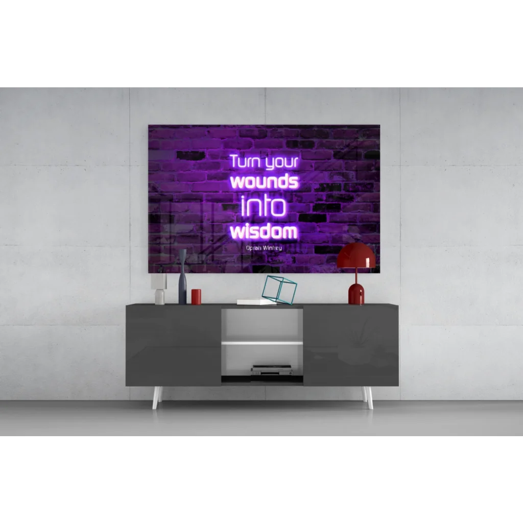 Purple neon glass wall art: Turn your wounds into wisdom on brick wall