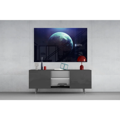Sleek TV showing vivid Earth on glass wall art with starry space view