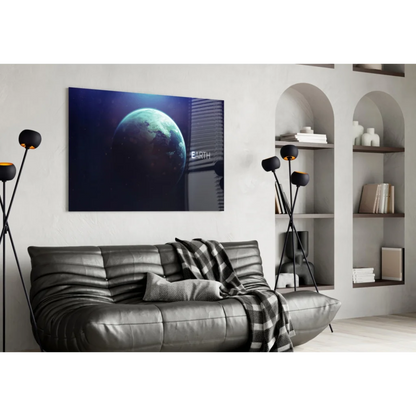 Black leather sofa with quilted texture and gray throw on Earth Canvas glass wall art