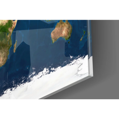 Sleek glossy glass wall art of world map in earthy tones