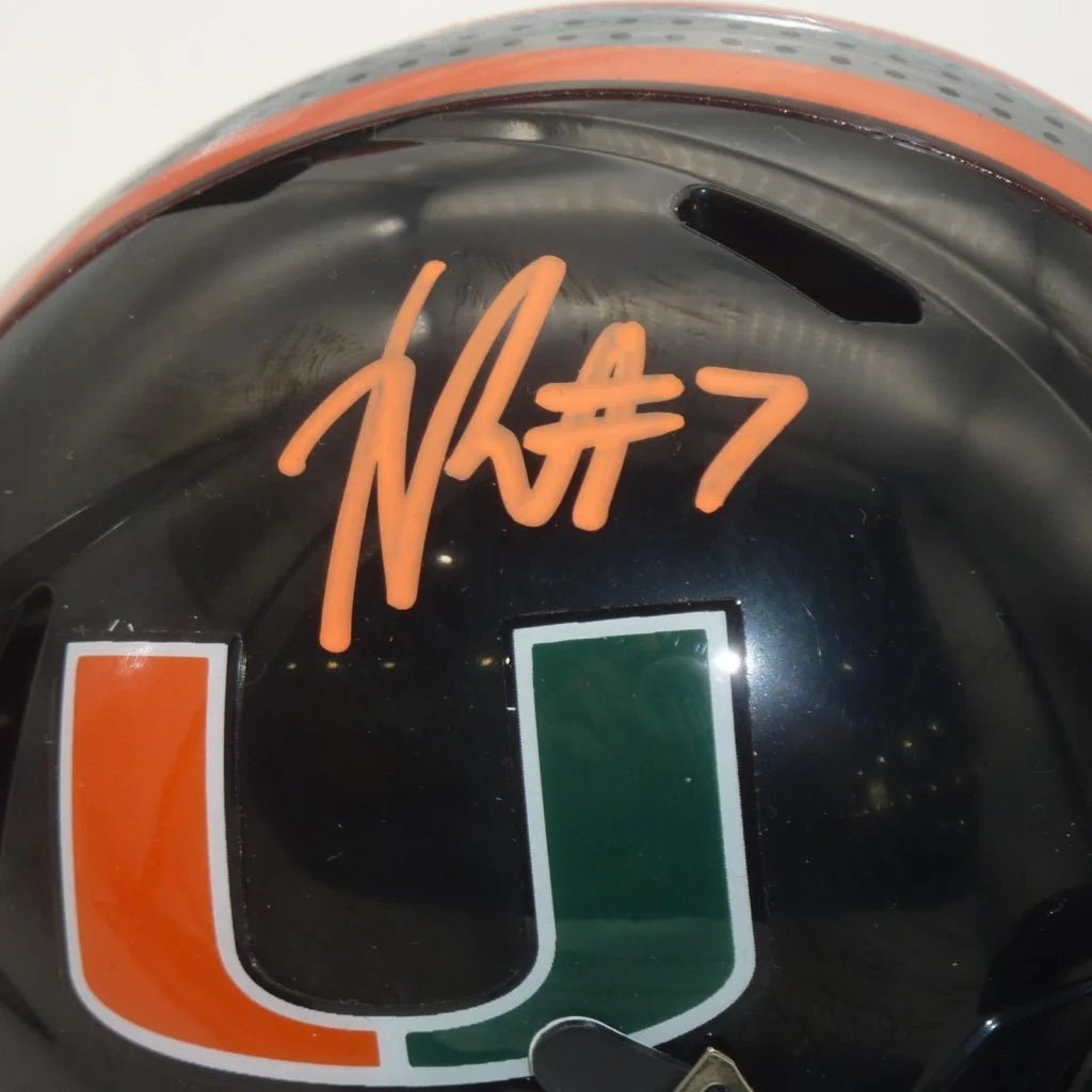 Xavier Restrepo signed Miami Hurricanes mini helmet in black with orange green accents