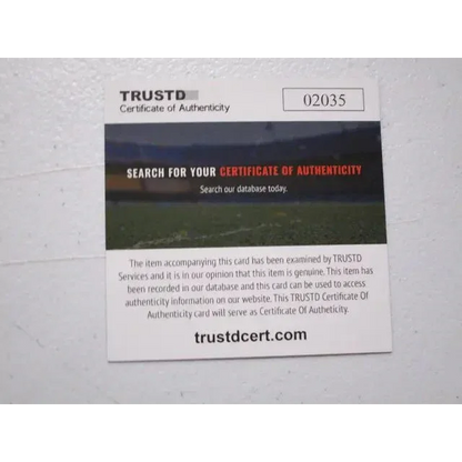 White certificate of authenticity card with unique ID for Yankees signed autographed program