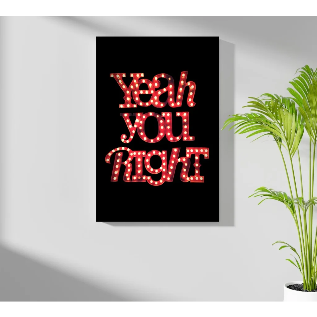 Black canvas print of Yeah You Right in bold red marquee lettering with light bulbs
