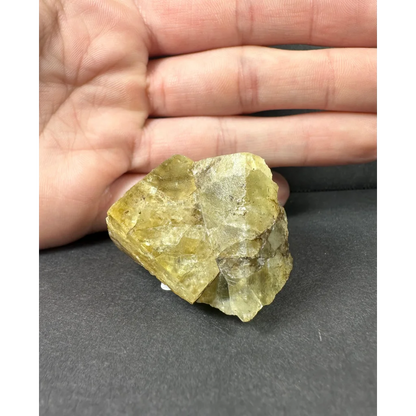 Yellow cubic fluorite cluster: rough translucent yellow-green crystalline specimen