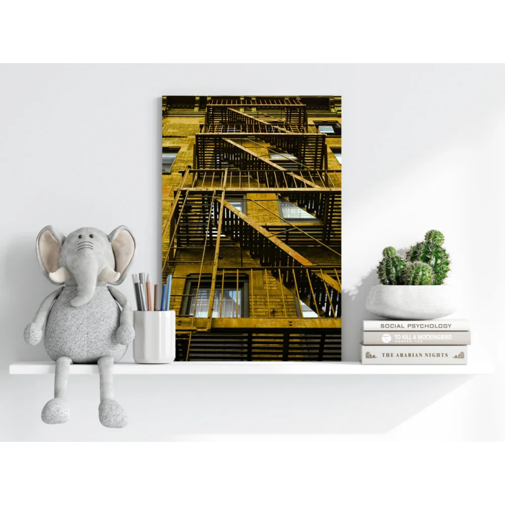 Golden-brown fire escape on brick wall, yellow staircase canvas print