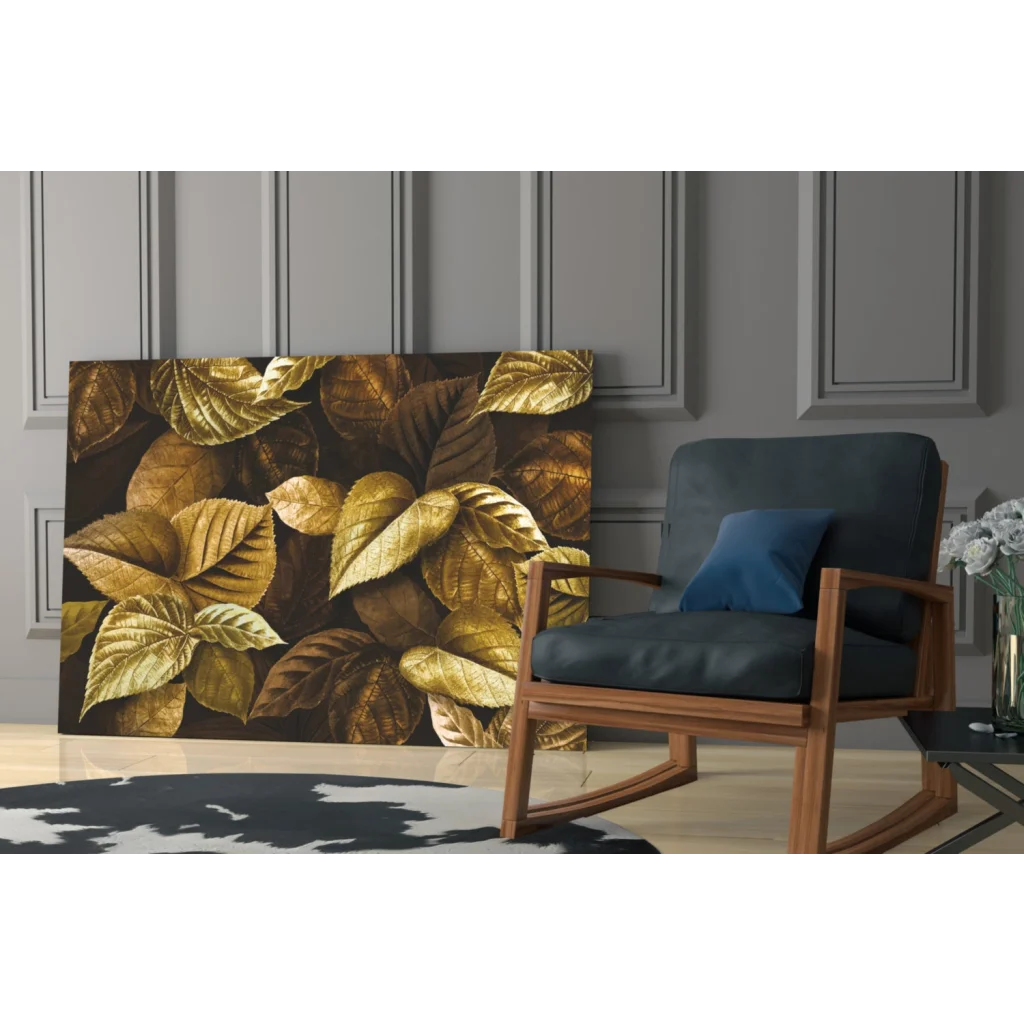 Golden leaves canvas wall art leaning on gray paneled wall