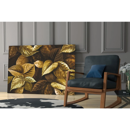 Golden leaves canvas wall art leaning on gray paneled wall