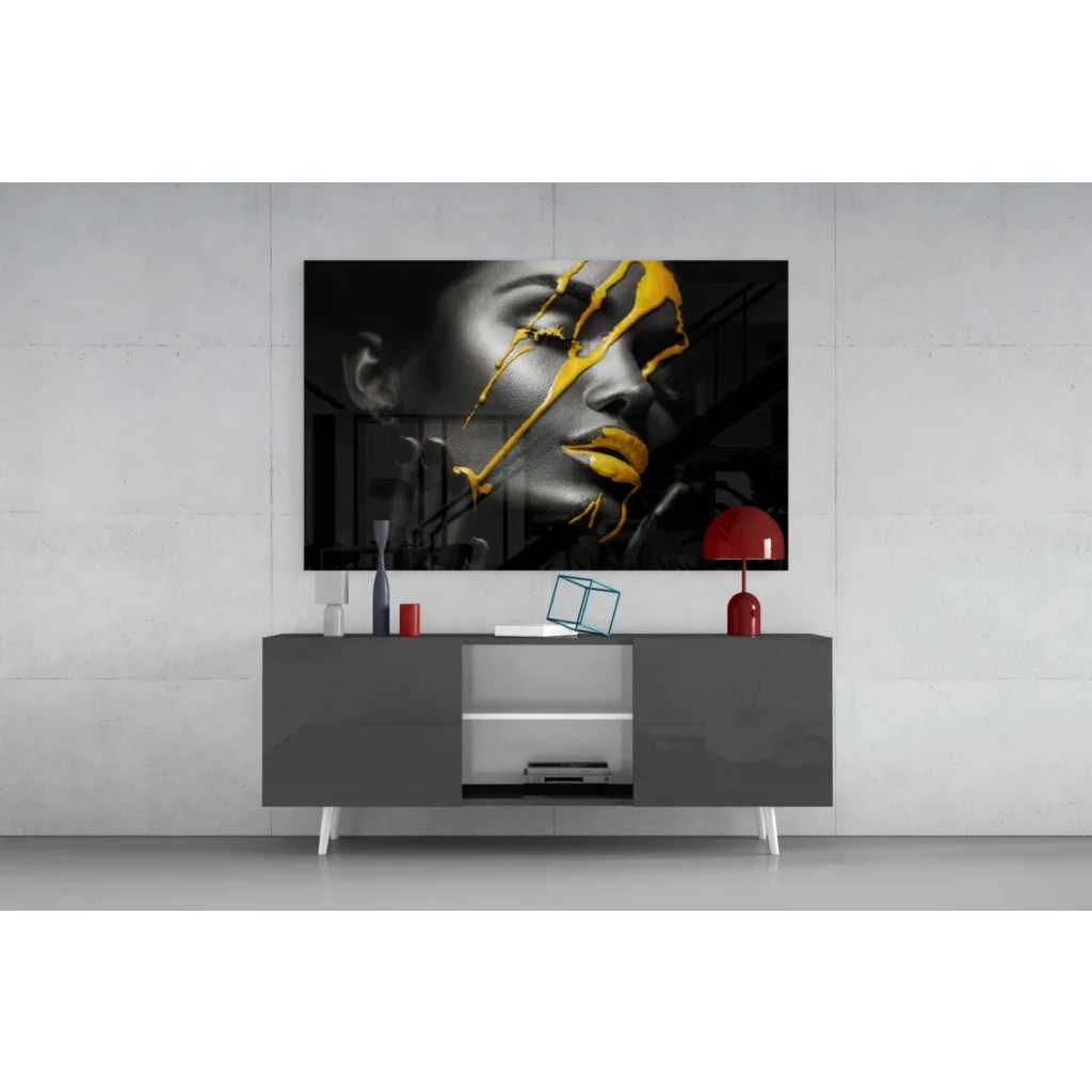 Bold gold drip black-and-yellow abstract portrait wall art canvas above gray console