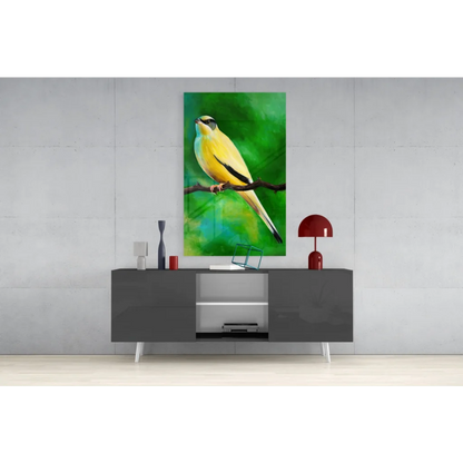 Vibrant yellow bird glass wall art on textured green background