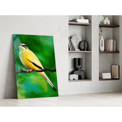 Vibrant yellow bird glass wall art on green canvas, perched on branch