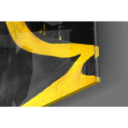 Bold yellow abstract portrait on glossy glass wall art
