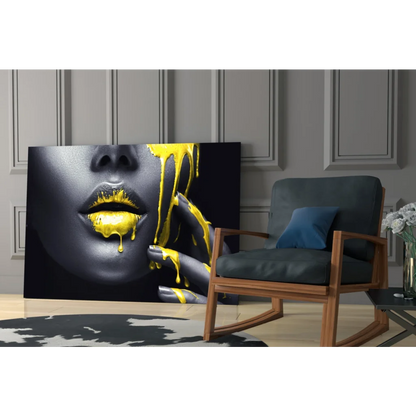 Black and gold abstract woman face wall art with dripping yellow paint on canvas