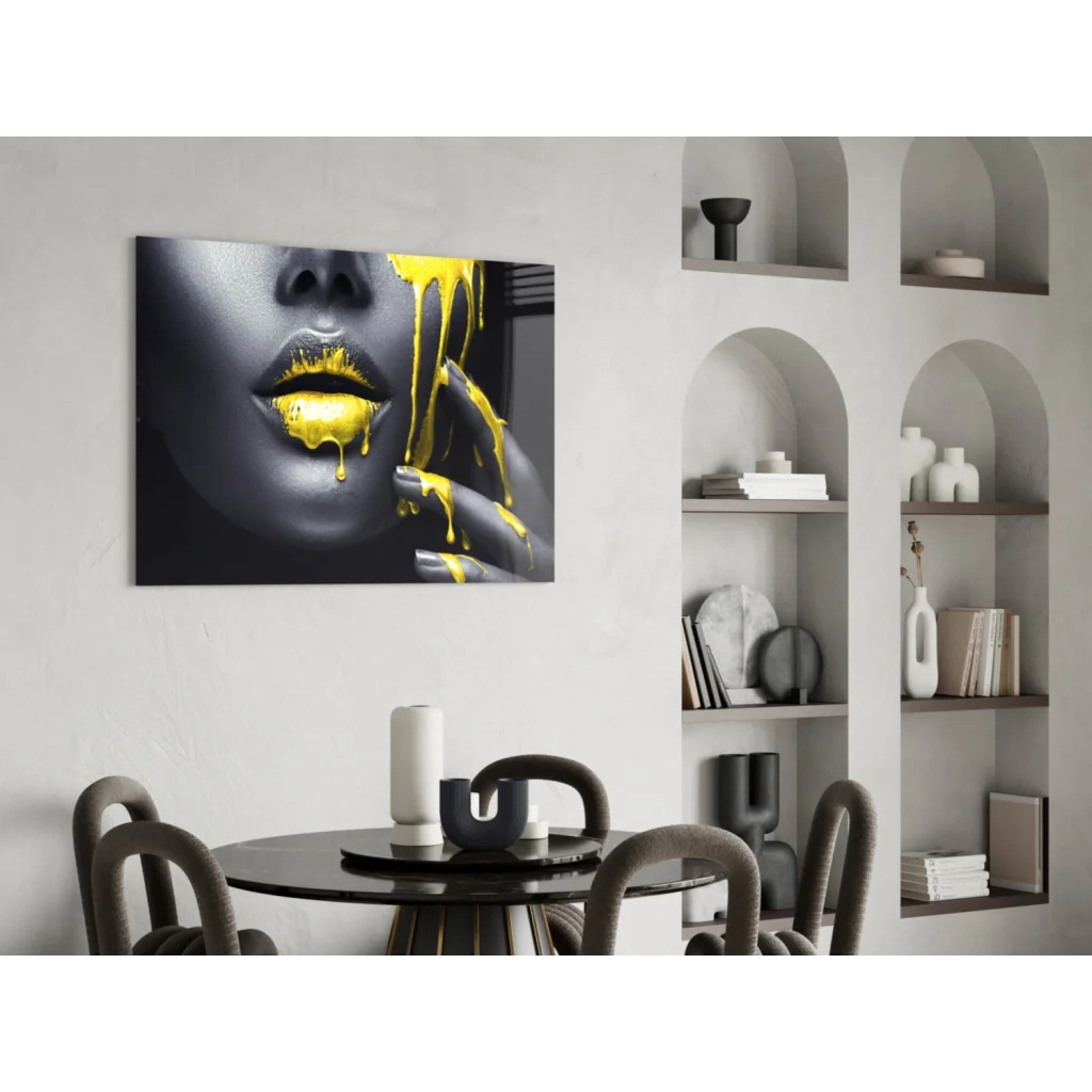 Black and gold lips canvas wall art with dripping yellow paint close-up