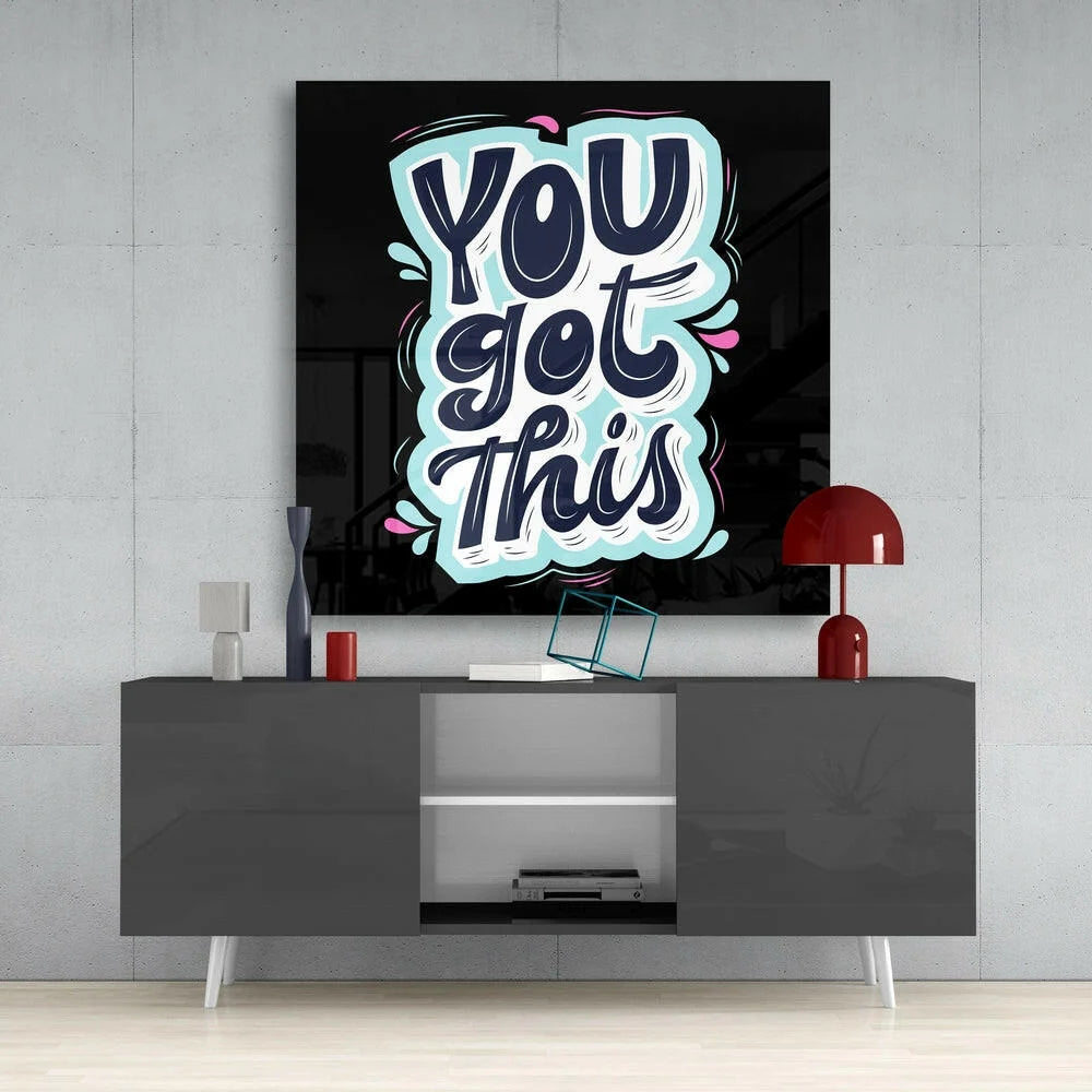 You got this glass wall art with navy graffiti on black canvas