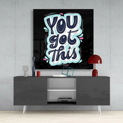 You got this glass wall art with navy graffiti on black canvas