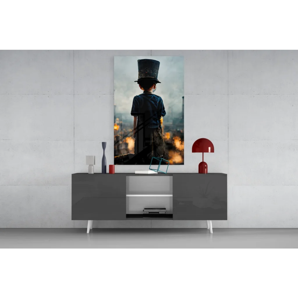 Child in blue shirt with black top hat in moody city lights glass wall art