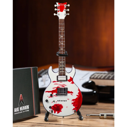 Miniature white Zacky Vengeance Blood Splat Axe Heaven® guitar on adjustable A-frame stand