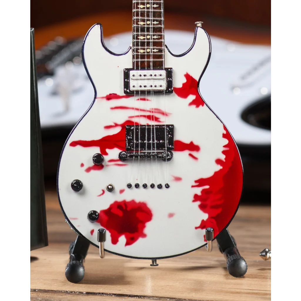 Zacky Vengeance Blood Splat Axe Heaven guitar replica on adjustable A-frame stand