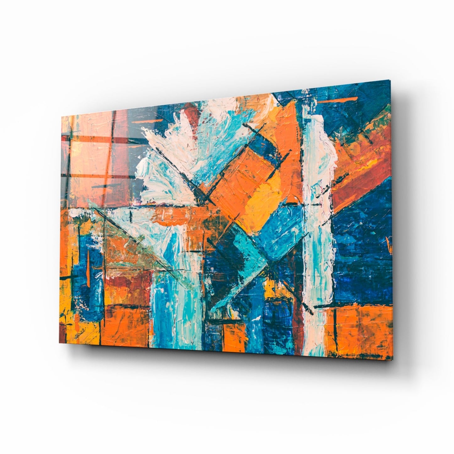 Abstract glass wall art featuring bold geometric blocks in orange, blue, white, and teal with expressive brushstroke textures, displayed at an angled perspective.