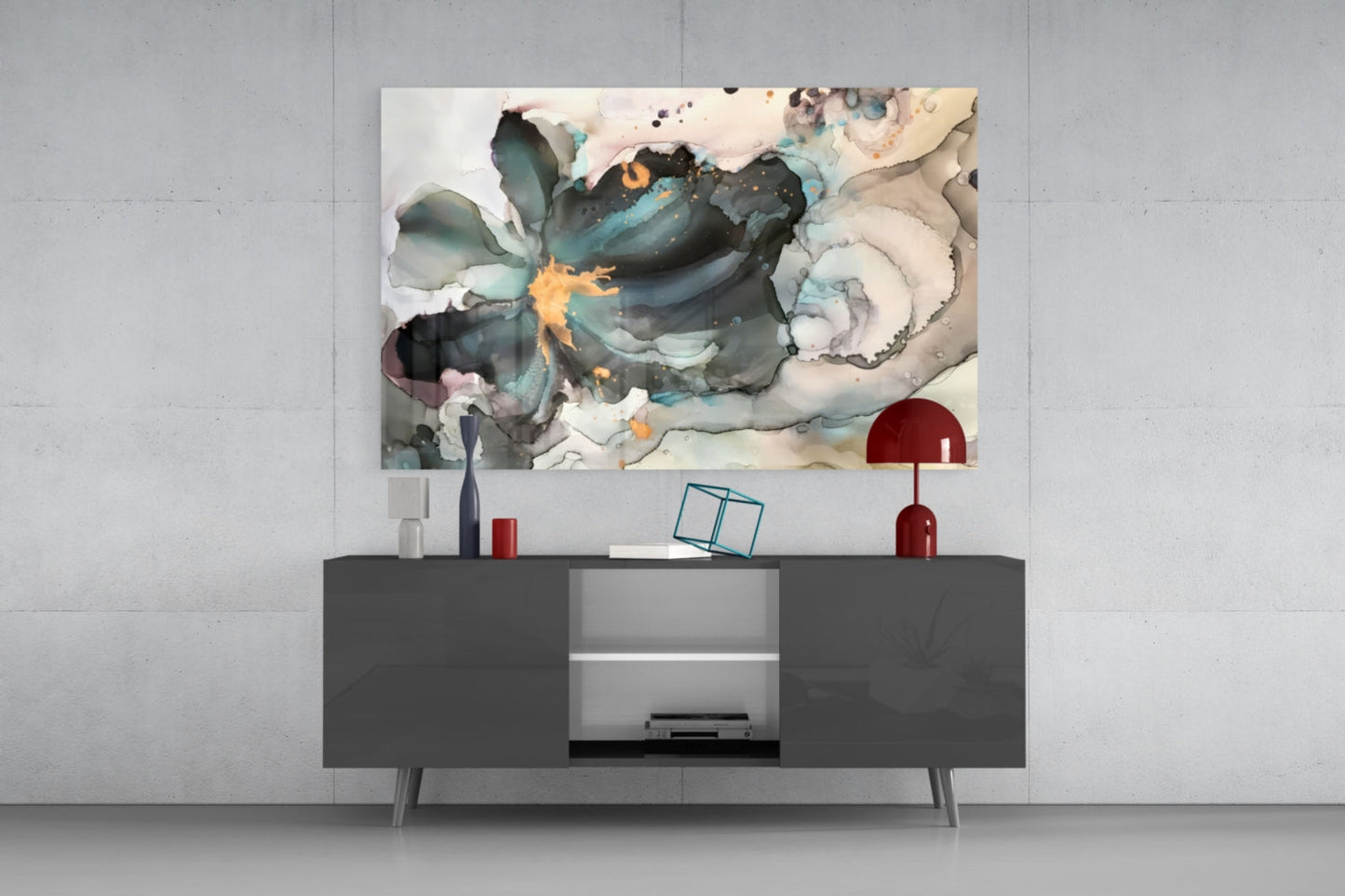 Abstract glass wall art with fluid watercolor design in teal, navy, gold, and cream tones displayed above dark modern console table.
