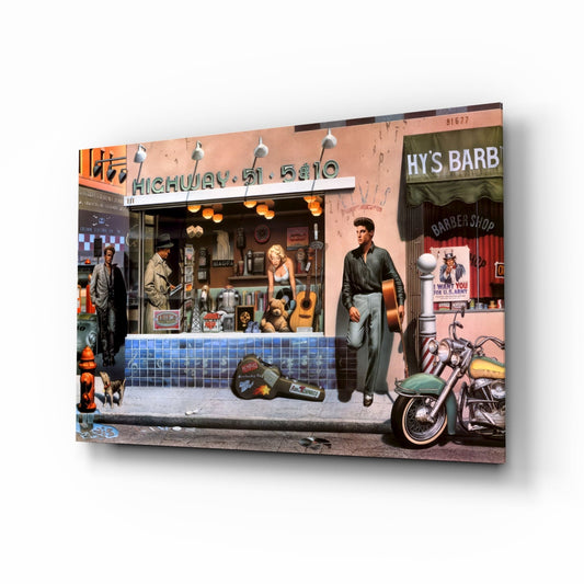 Angled perspective view of retro diner storefront glass art featuring vintage figures, motorcycles, neon signs, and 1950s Americana décor on coral-pink building facade.