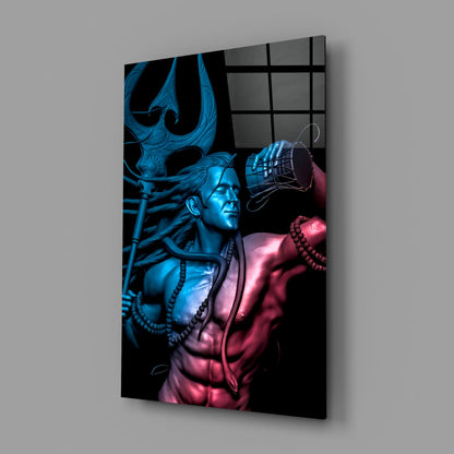 Glass wall art panel angled view showing blue-lit deity figure and pink-lit muscular form against black background with grid pattern overlay.