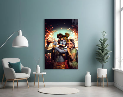 Krishna and Radha glass wall art displayed in a modern living room with turquoise walls, white furniture, and potted plants.