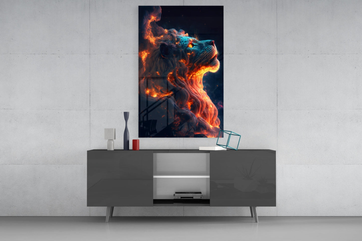 Fire Lion Glass Wall Art displayed above a dark gray media console in a minimalist room setting, showing orange flames and turquoise accents.