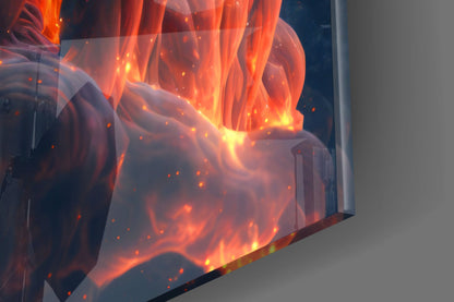 Close-up angled view of glass wall art displaying vibrant orange and yellow flames with glowing embers against dark background.