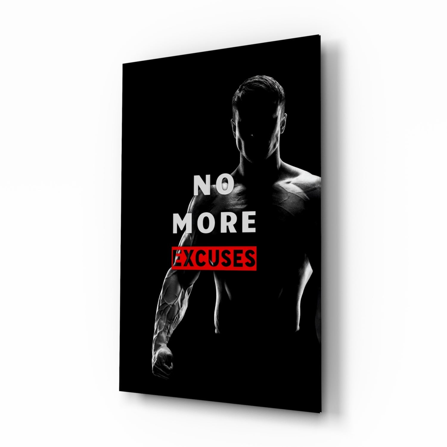 Black and white glass wall art featuring a shirtless man in profile with "NO MORE EXCUSES" text in red, displayed at an angle.