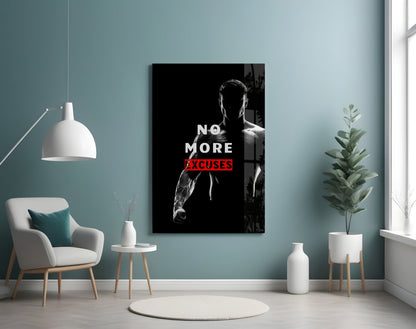 Black and white glass wall art featuring muscular man with "NO MORE EXCUSES" text in red, displayed in light blue room with chair and plants.