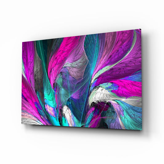 Angled perspective of Pink Dream Glass Wall Art displaying vibrant magenta, cyan, and purple swirling abstract patterns with white accents on glass surface.