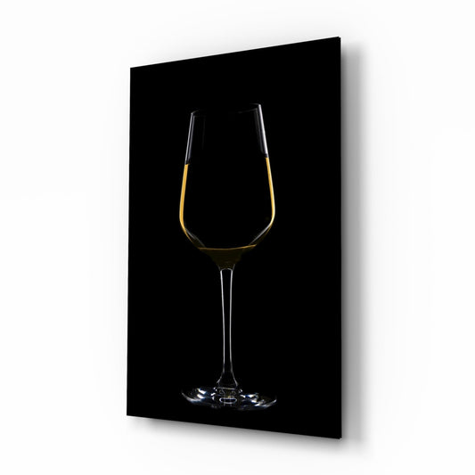 Wine glass with golden rim and pale yellow liquid against black background, displayed as mounted wall art.