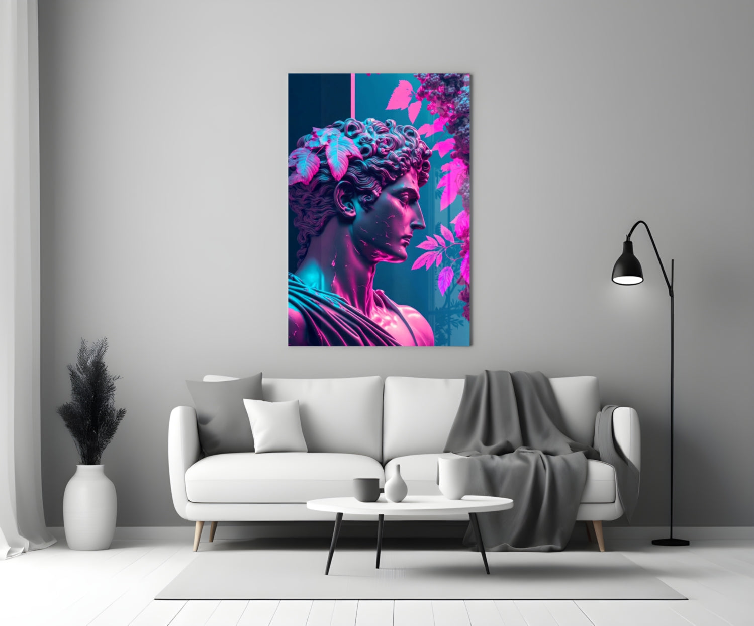 Neon-lit glass art depicting a classical sculpture profile in magenta and cyan tones displayed above a white sofa in a modern living room.
