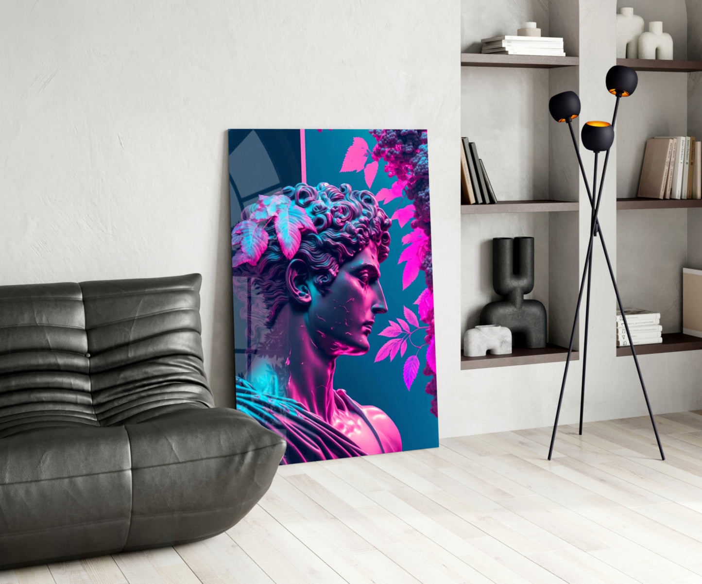 Vibrant neon pink and cyan glass wall art featuring classical sculpture profile with magenta foliage on teal background, displayed in modern living room interior.