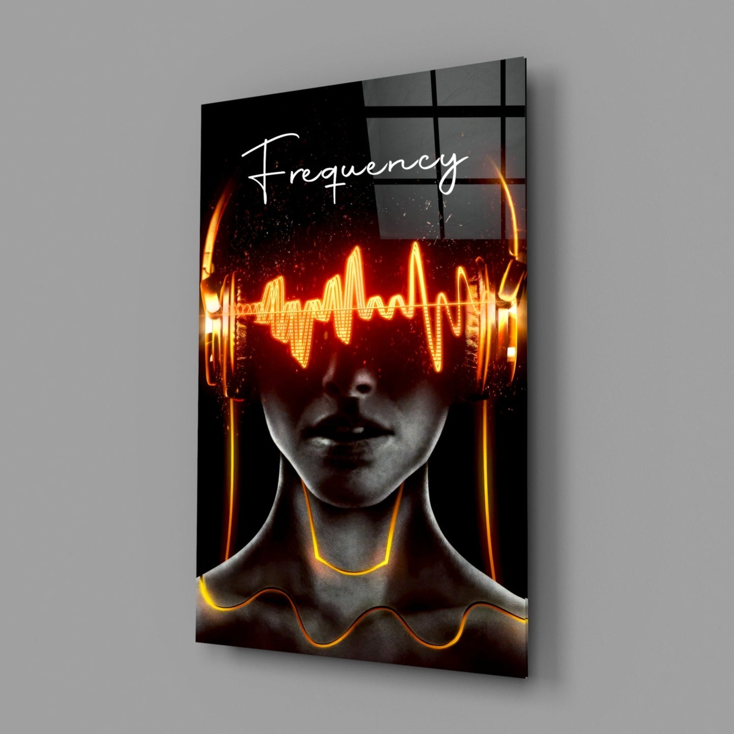 Angled view of glass wall art featuring a figure with neon orange sound wave graphics across eyes and neck, "Frequency" text, mounted on gray wall.