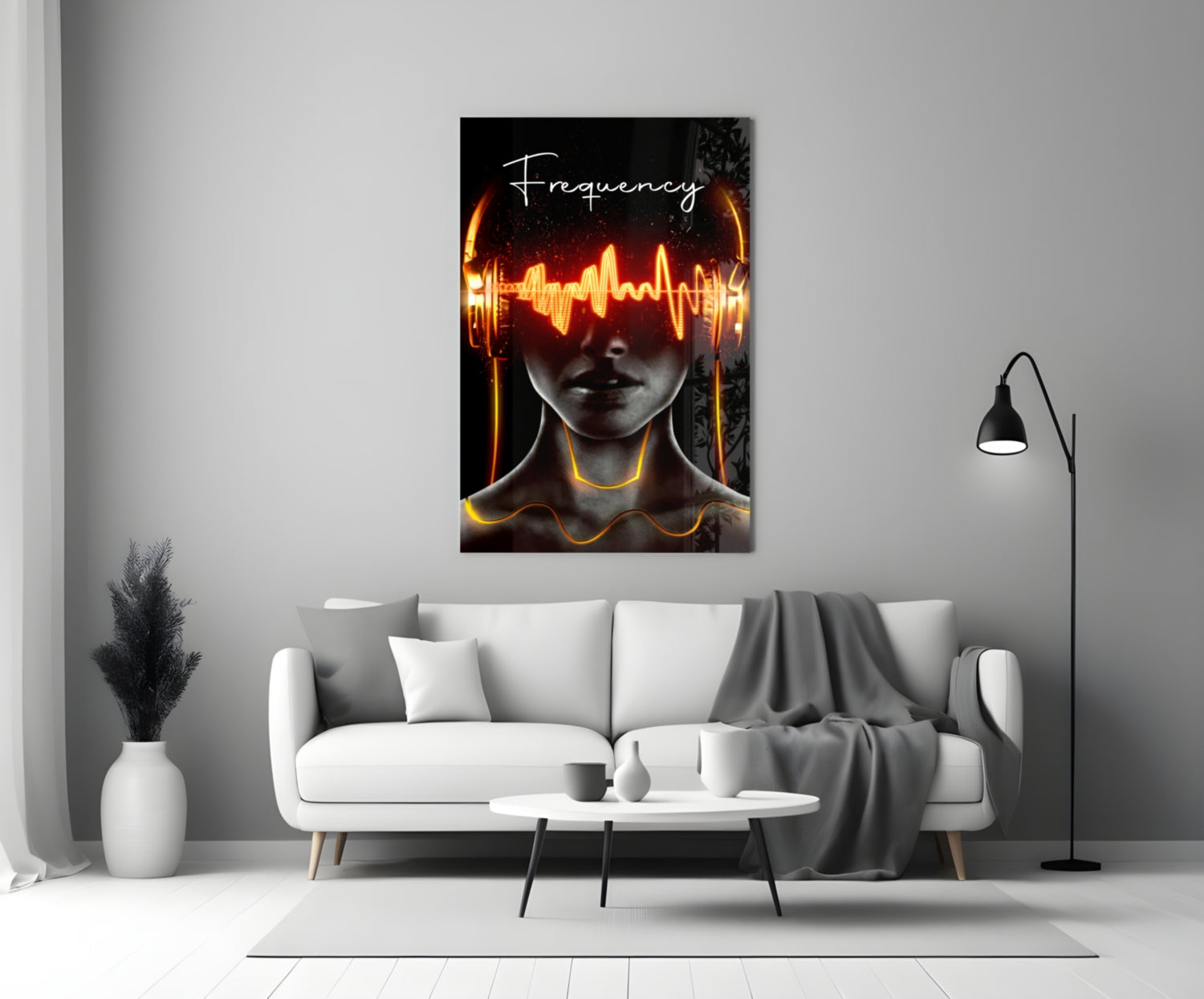 Modern living room with white sofa displaying neon glowing "Frequency" glass wall art above it.