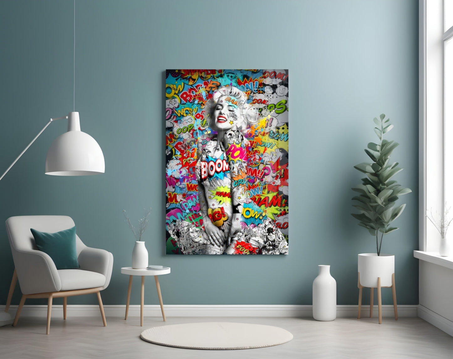 Pop art style glass wall art featuring a black and white portrait with colorful comic book words and red lips displayed in a modern living room interior.