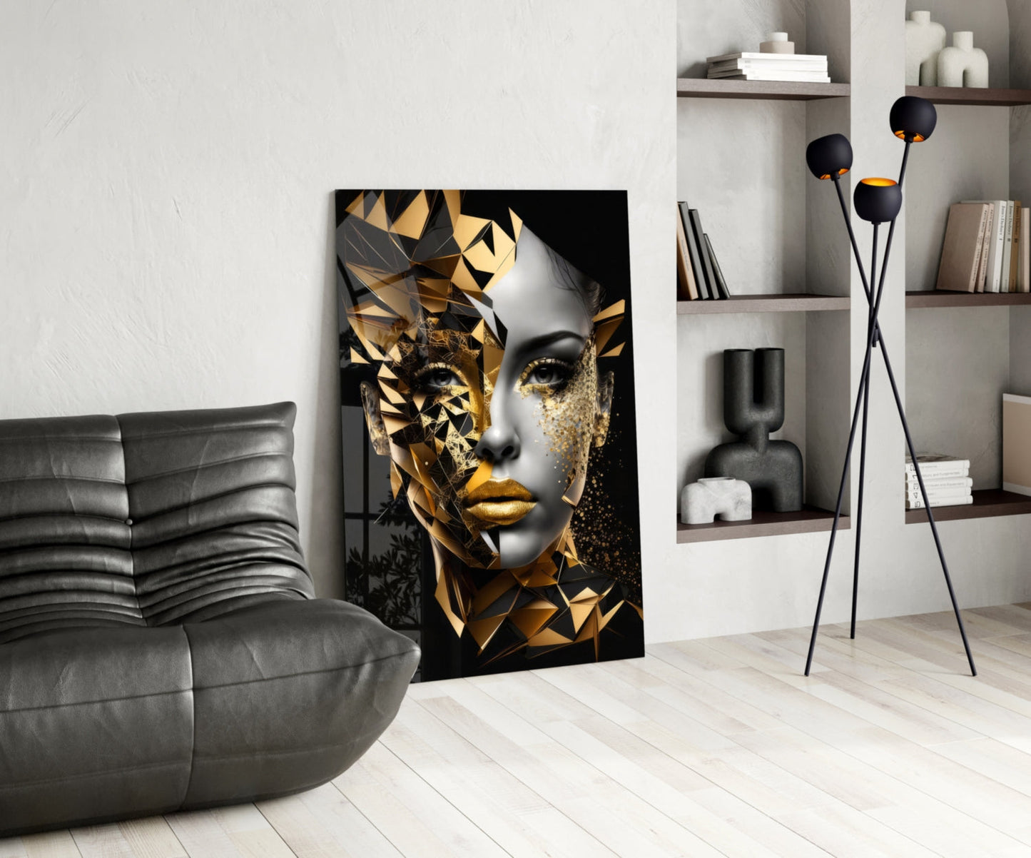 Golden Face Glass Wall Art displayed in modern living room with gray sofa, shelving, and floor lamp.
