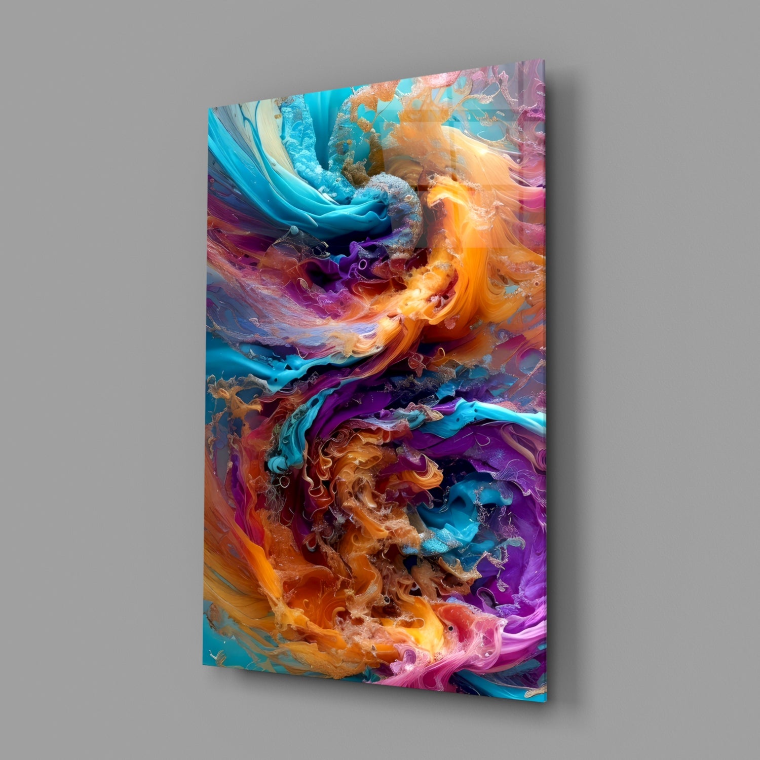 Angled view of vibrant glass wall art displaying swirling turquoise, orange, purple, and pink liquid patterns with three-dimensional depth against gray background.