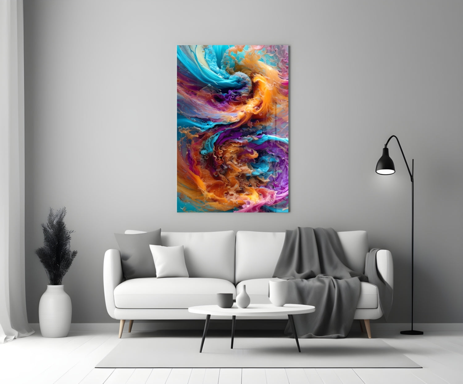 Vibrant multicolored glass wall art with swirling blue, orange, and purple patterns displayed above a white sofa in a modern living room.