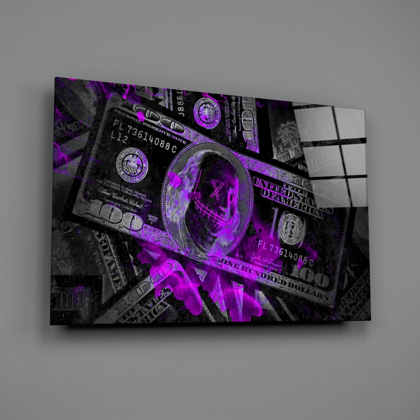 Glass wall art displaying overlaid US dollar bills with neon purple and black color scheme, mounted at an angle against gray background.