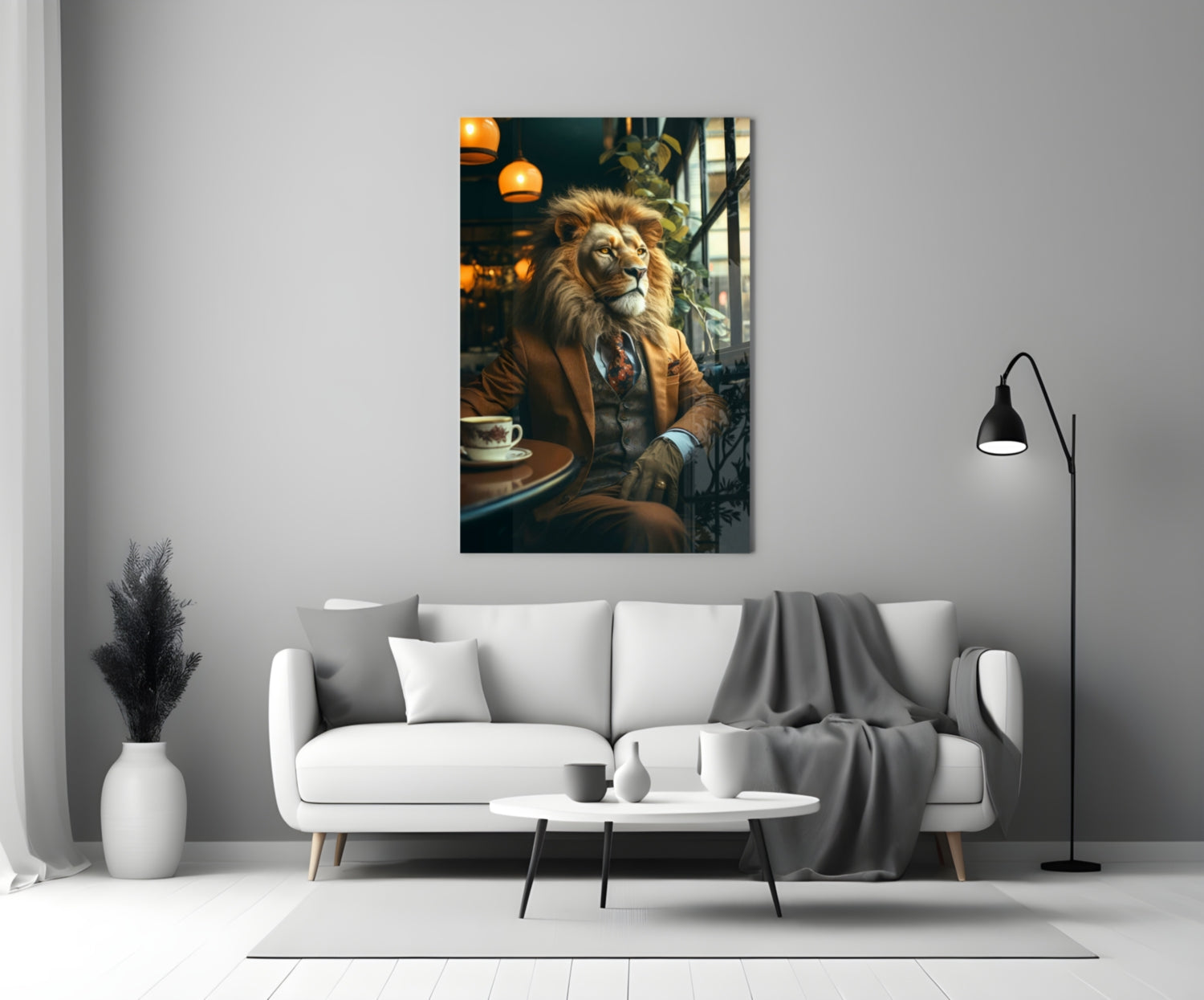 Lion in brown blazer seated at café table with coffee cup, displayed as glass wall art above living room sofa.