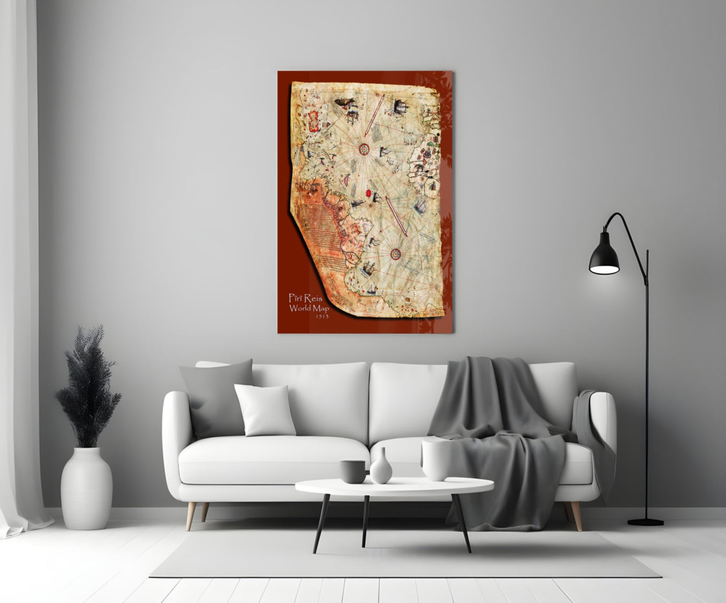 Piri Reis World Map 1513 glass wall art in rust-red frame hanging above white sofa in modern living room.