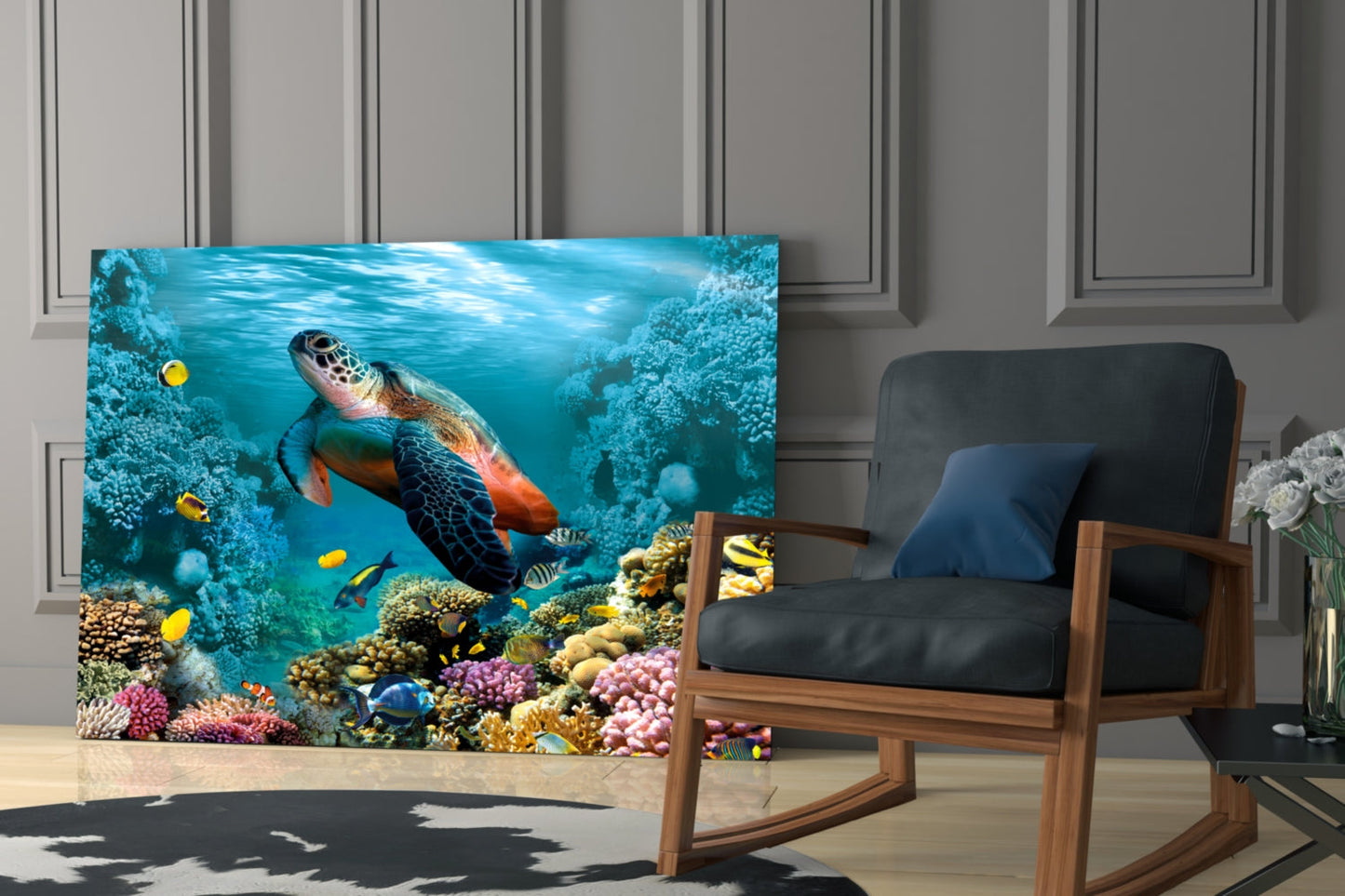 Glass wall art displaying a colorful underwater coral reef scene with sea turtle and tropical fish in a modern living room setting.