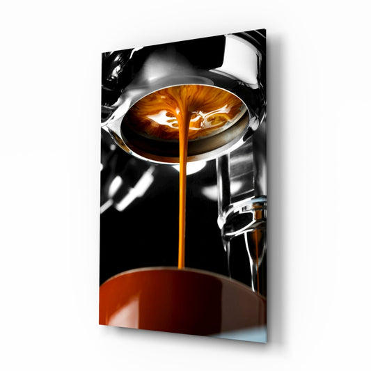 Rich brown espresso streams from chrome portafilter into ceramic cup against black background, closeup side view.
